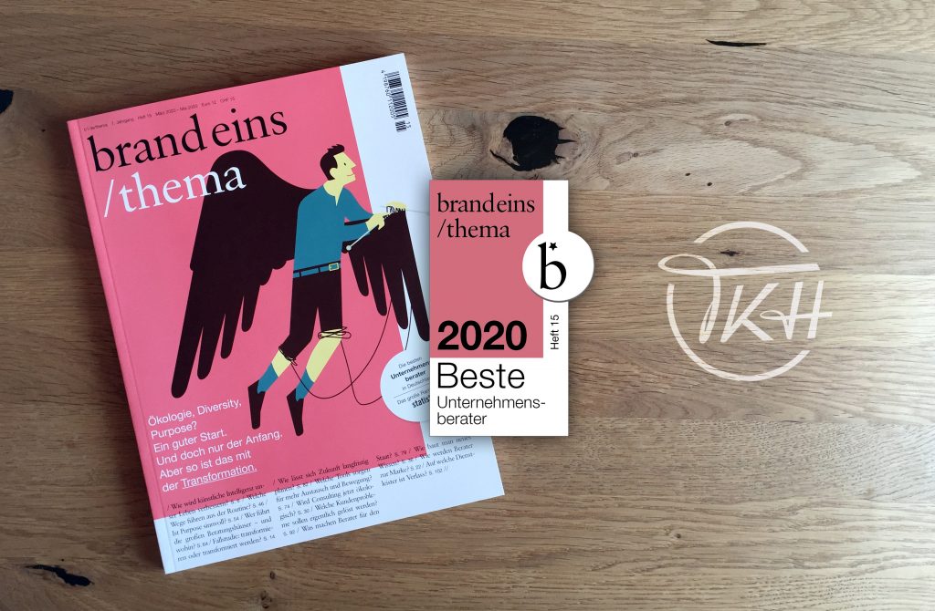 brand eins thema magazine announcing Best Consultants Germany 2020 on wooden table.