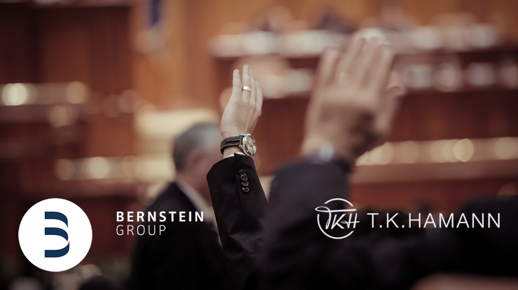 Bernstein Analytics corporate meeting vote with raised hands and governance discussion.